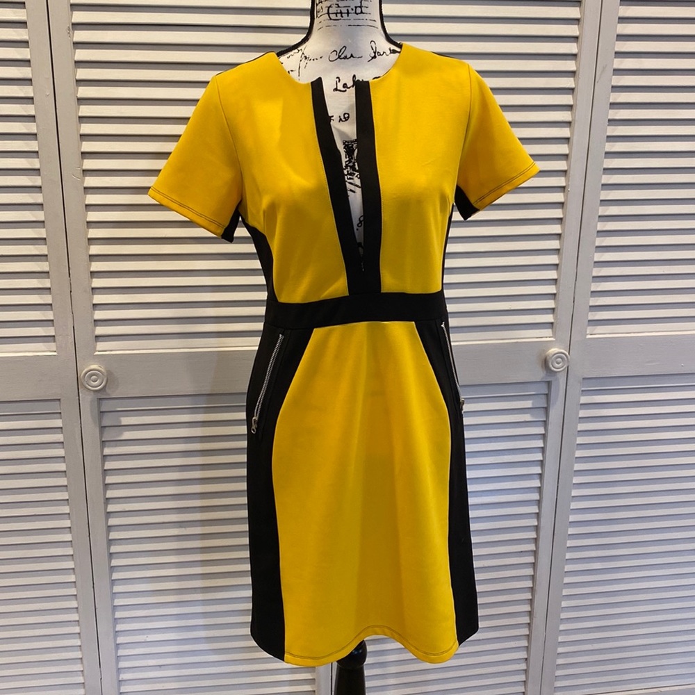 ILE size 8 yellow and black dress.